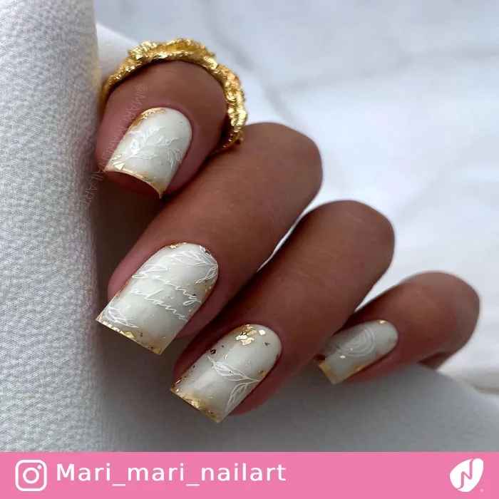 Gold and White Nails with Silhouette Leaves